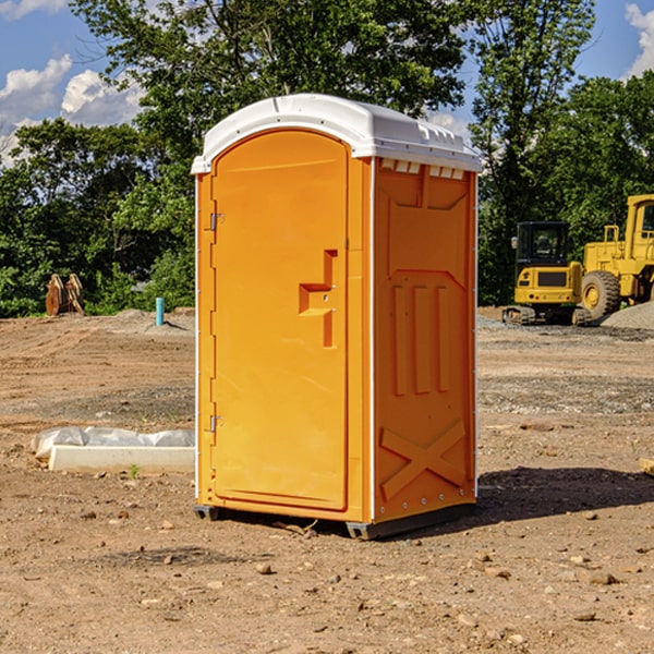 how often are the porta potties cleaned and serviced during a rental period in Roggen